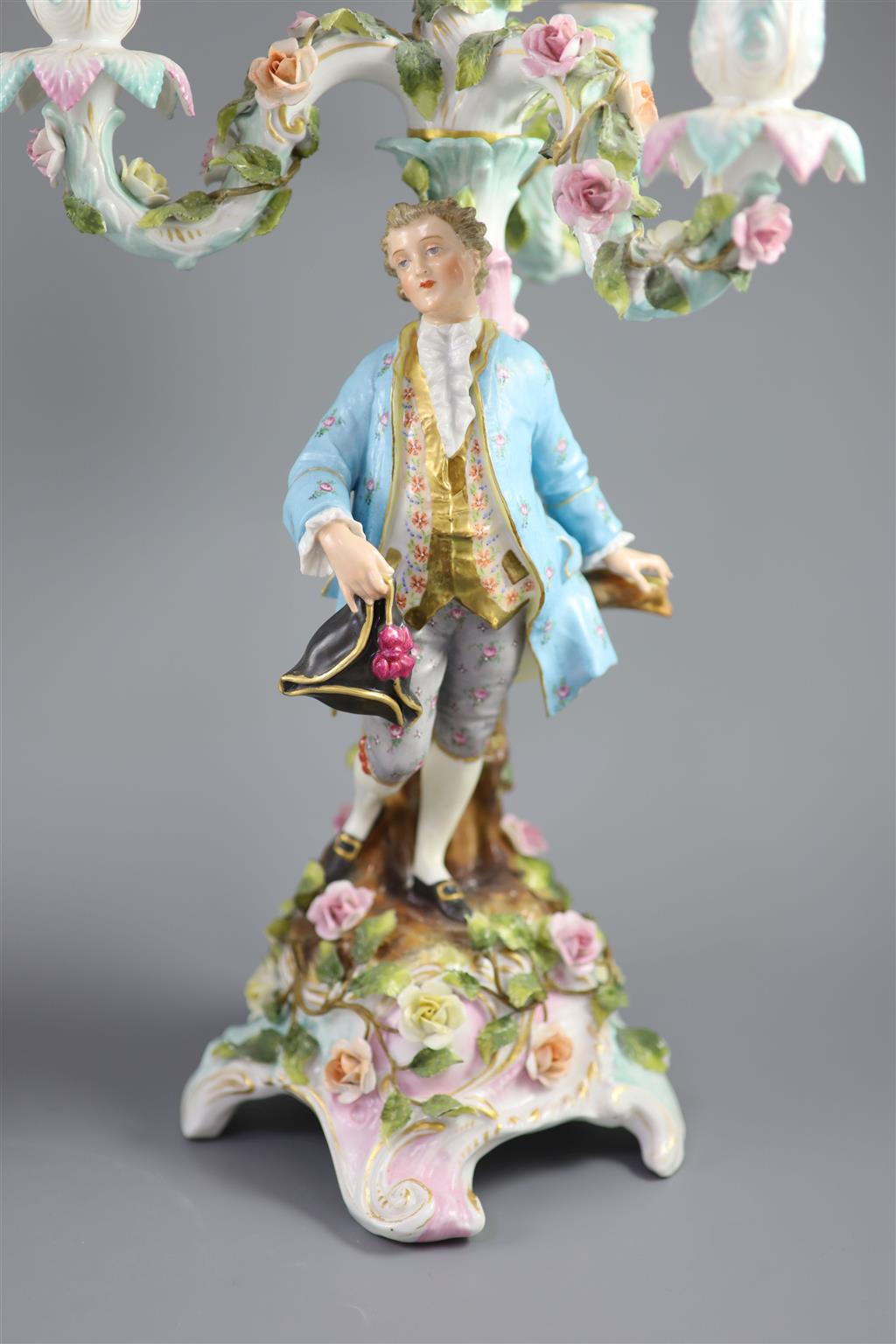 A pair of early 20th century Plaue porcelain figural candelabra, overall height 48cm